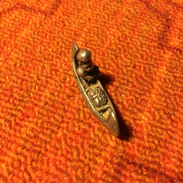 Man in a Canoe - figurine